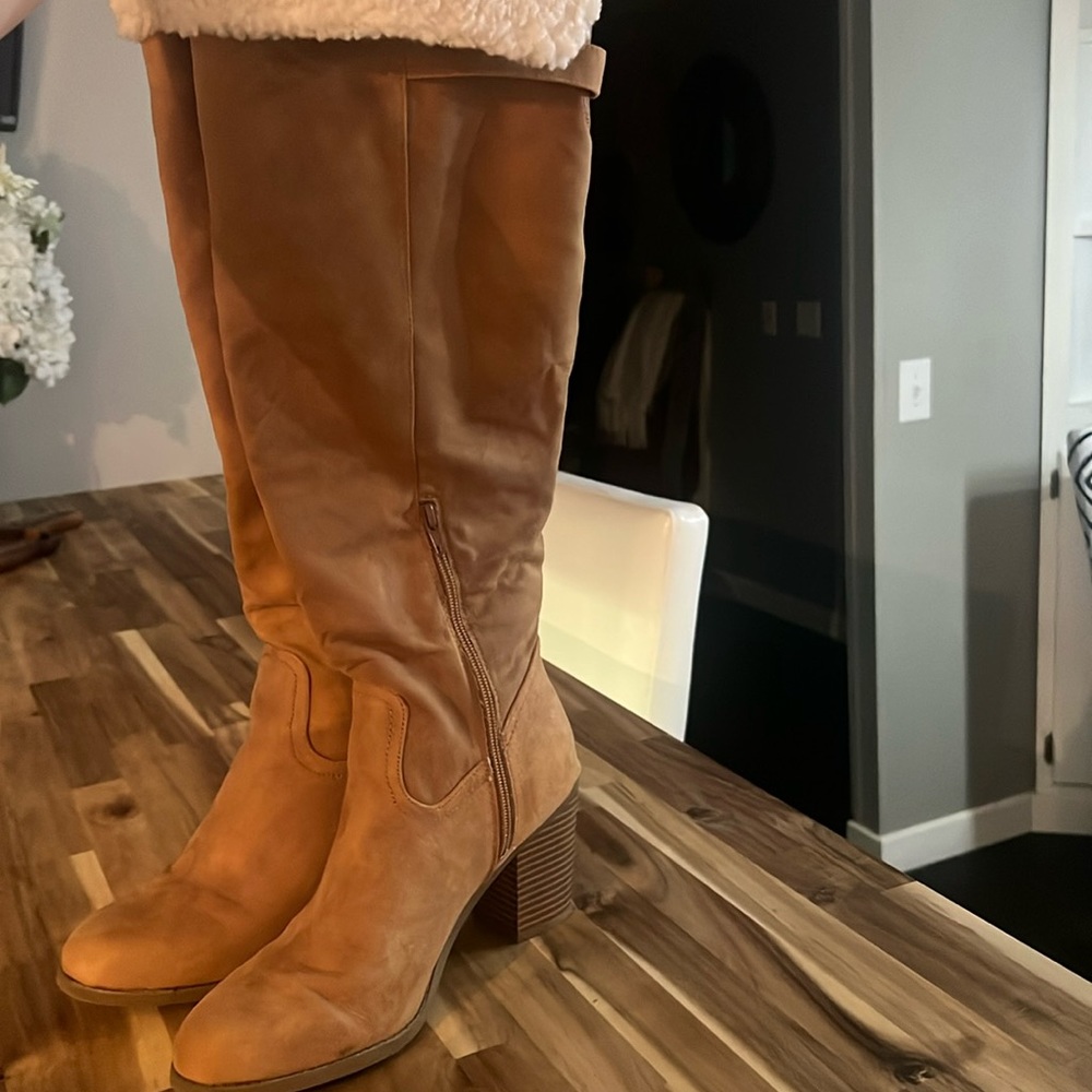 Woman’s Tan and Beige tall boots